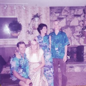 Family photo with our awesome step-father. I think my mom planned a Hawaiian style party or something.